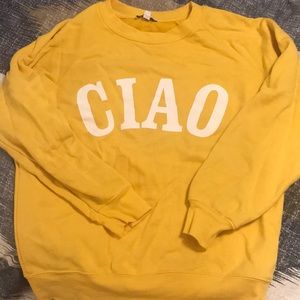 Subdued brand yellow Ciao sweatshirt.